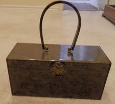 c. 1950's Lucite Purse Wilardy embossed inside; flower clasp; brown marble-like