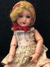 Antique French Doll With Its Clothes