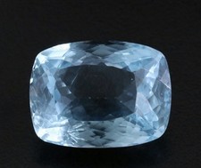 Faceted cushion-cut blue topaz gemstone weighing 27.92 carats