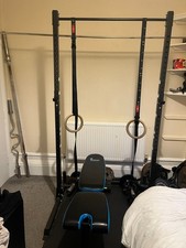 Squat Rack, Bench, Bars, Rings, Weights and entire gym setup.