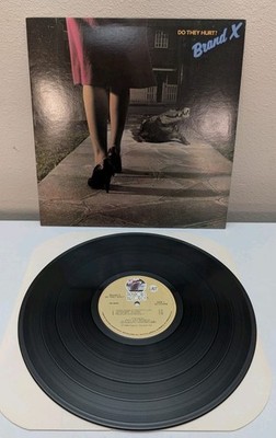 Brand X Do They Hurt? 1980 Passport Records LP Jazz Fusion Phil Collins Drums