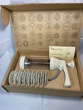 The Pampered Chef 1525 Cookie Press with 16 Discs - White
