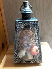 Vintage Thanksgiving lantern with scarecrow a...