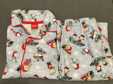 Peanuts Christmas pajamas featuring Charlie Brown, Snoopy, and Woodstock sz 6-7