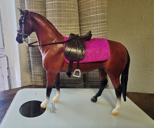 Breyer Classic Freedom series Jet Run warmblood standing with English Saddle.