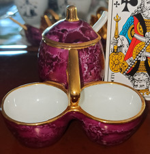ensemble de salerons et pot a moutarde  porcelaine Limoges Fragonard   bon états