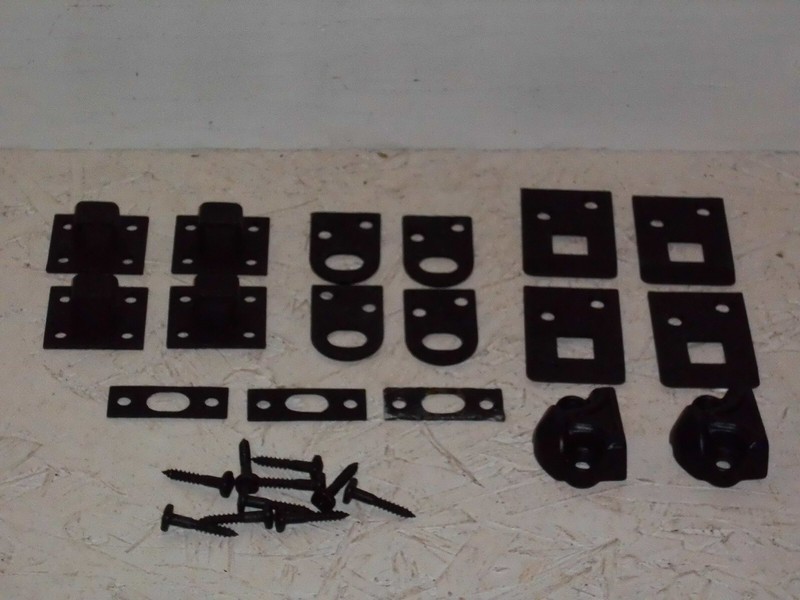 Variety of black iron door bolt keepers.