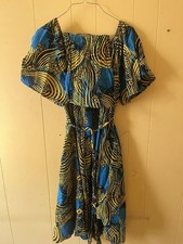 African Fabric Dress with Belt and Scar, White Long sleeve Shirt. Neutral Skirt