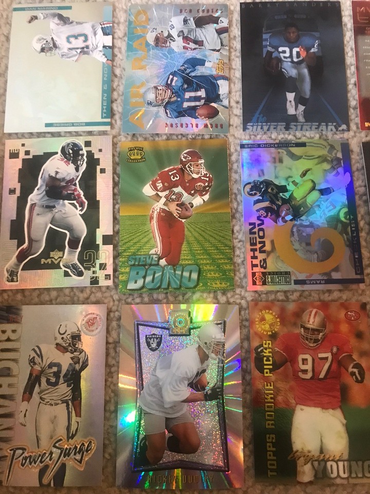 LOT 45 - 90’s FOOTBALL PREMIUM INSERTS W/ JERRY RICE, SER. #d, BARRY ...