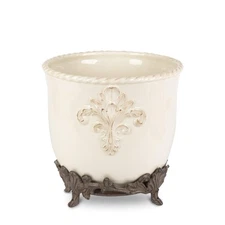 GG Cream Stoneware Planter on Metal Acanthus Leaf Base.