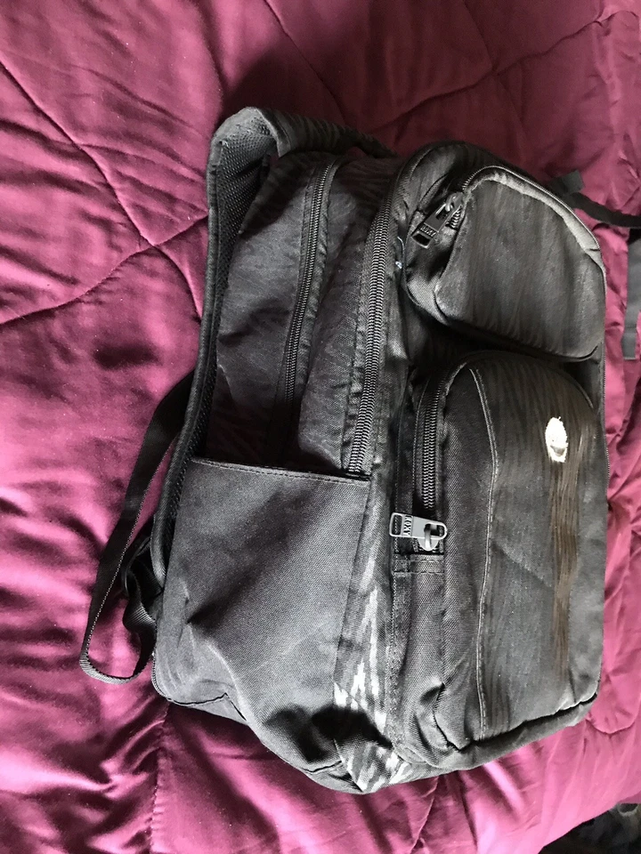 Mochila y bolsa para libros ROXY TwoToneed negra diseñada con cebra con funda acolchada para computadora portátil Foto 3 de 4