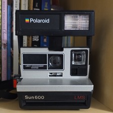 Polaroid Sun 600 LMS Instant Film Camera for 600 Film w/ Strap Black/Silver