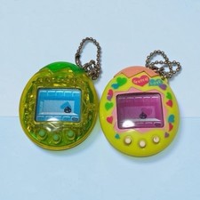 Bandai Tamagotchi Osutchi Clear Green Mesuthi Yellow Heart Set of 2