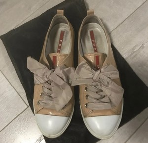 nude prada sneakers