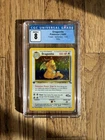 Pokémon TCG Dragonite Holo Rare 1st Edition 1999 Fossil CGC 8
