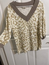 Bibi size small Cream And tan leopard print V-neck Blouse