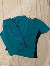 lot of medium womens scrubs tops and pants- includes 4 sets and 4 separates