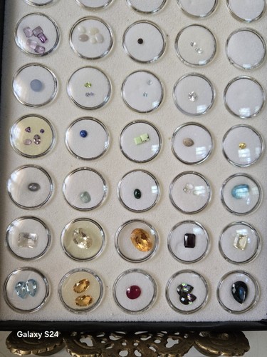 Lots Of Loose Faceted Mixed Colors Gemstones In A Display Case- ** ESTATE...