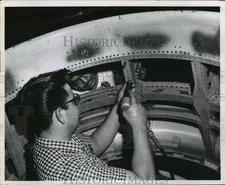 Press Photo Repairman Simon Rodriguez works on sheet metal of a B 52