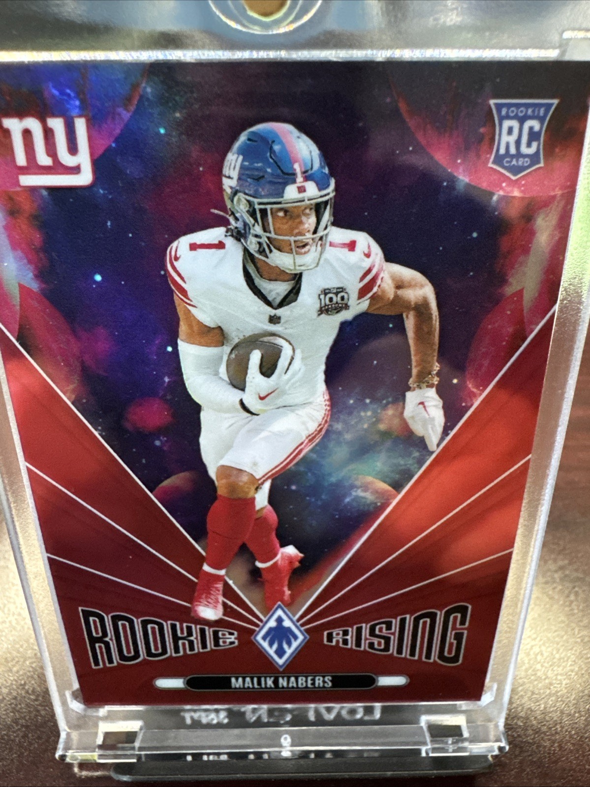 2024 Panini Phoenix - Rookie Rising Malik Nabers #RR-MNS Red /99 (RC)