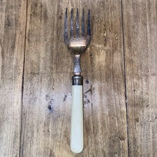 Large serving fork for fish ? silver  or Silver plate. Antique