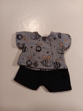 Puppenkleidung Größe 26 cm blaues Shirt mit Bienen und kurze Shorts