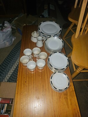  42 pc  Crown Ming fine china. Adriana with gold trim pattern