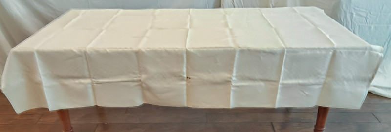 one damask tablecloth heavily stained  check pattern measures 63 in by 88 in.