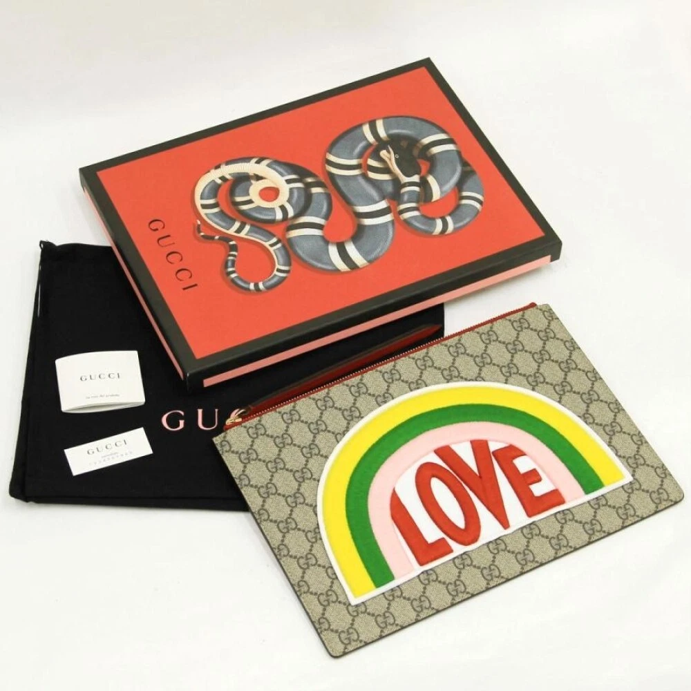 Gucci store love clutch