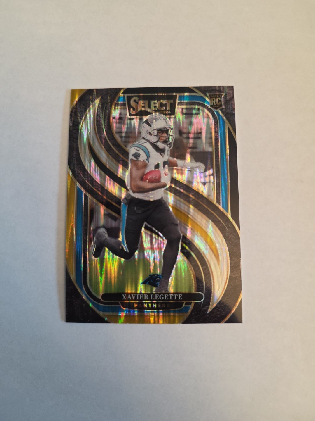 2024 Panini Select Premier Level Xavier Legette RC #101 Black & Gold Shock Prizm