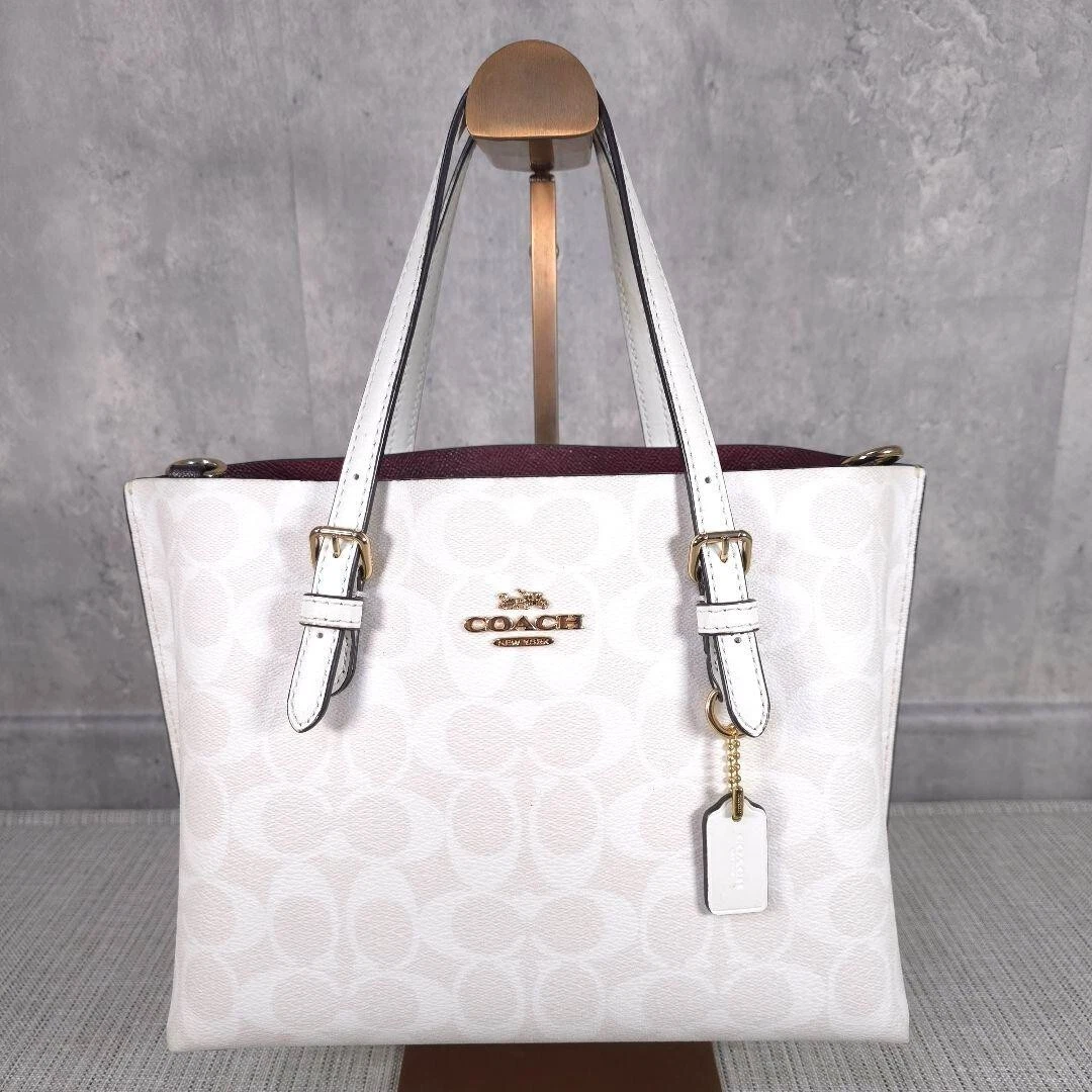 Borsa a tracolla Coach C4250 Molly 25 firmata in pelle con ciondolo logo