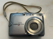 Nikon Coolpix P4 VR 8.1 MP Zoom Silver Digital Camera FOR PARTS OR REPAIR.