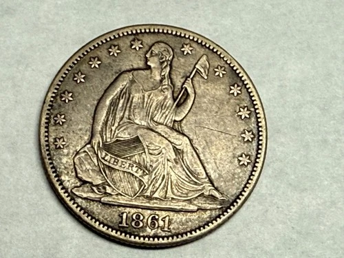 1861-O SEATED LIBERTY silver U.S. half dollar. XF, faint minor graffiti. #2nr2