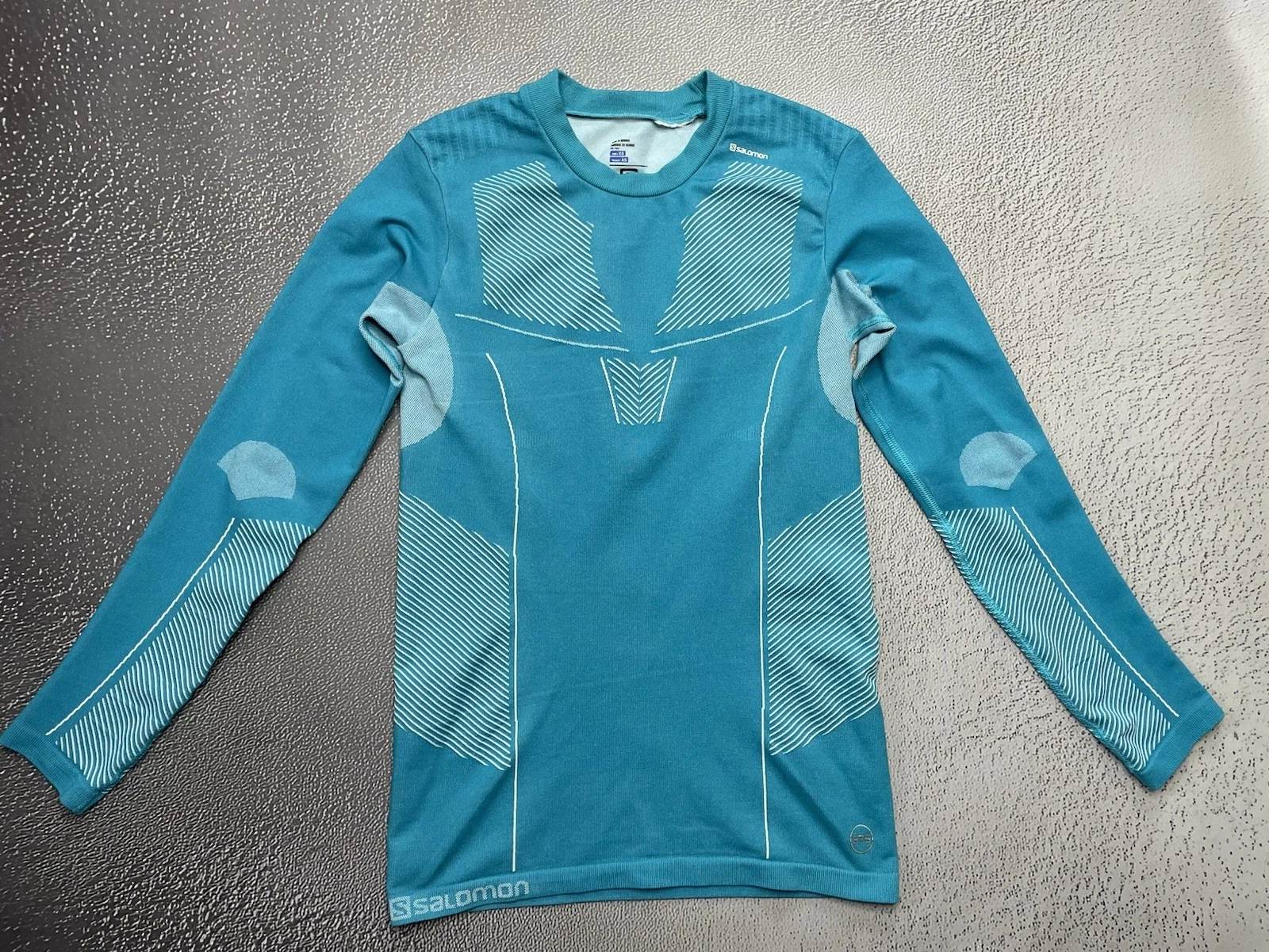 Salomon Women’s Aquamarine Green Primo Warm Seamless Tee Size XS
Opens in a new window or tab