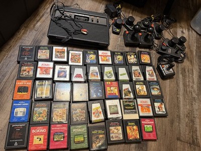 Atari 2600 System Bundle with Console, 44 Games, Joystick, Paddles, and More LOT