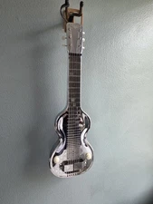 Rickenbacher [ Rickenbacker]   1940 “Silver Hawaiian.” Lap Steel guitar