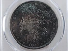 NobleSpirit STUNNING TONING 1883 O Morgan Silver Dollar PCGS MS64