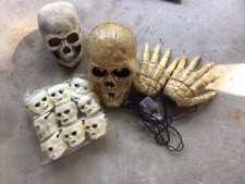 Halloween Skull heads, lot of two lage and 9 treat skulls