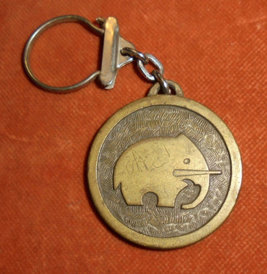 Pretty Nice Black Elephant Cafes Bronze Keychain (Stylized)