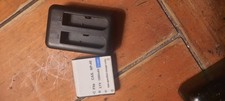  1This is a generic,replacement Casio NP-40Li-ion battery in a charging dock