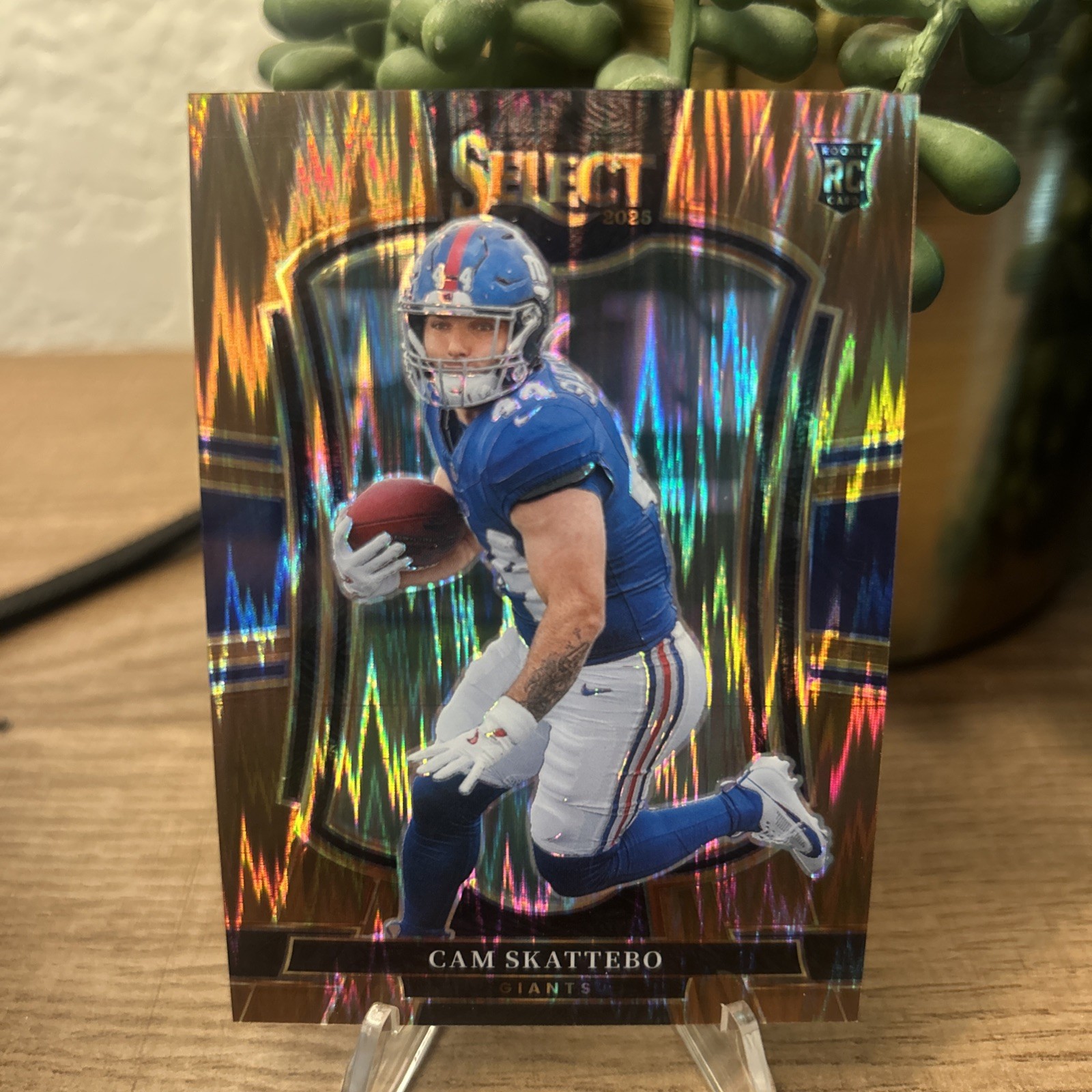 2025 Panini Select Premier Level Copper Shock #'d /899 Cam Skattebo RC #195