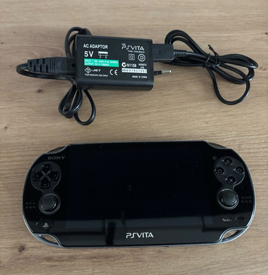 Sony PS Vita PCH-1004 OLED Schwarz 8GB Wi-Fi Handheld-Konsole + Ladekabel