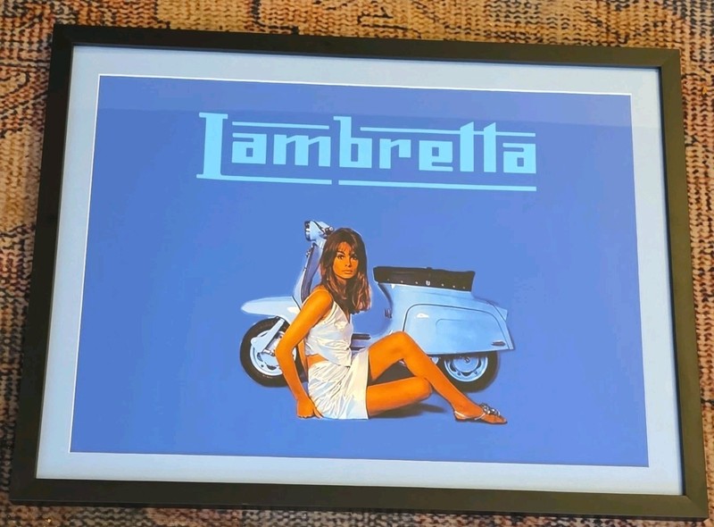 1960's original.Lambretta Framed Poster Blue Background Scooter and Woman