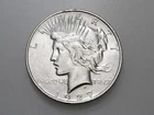 1927-D $1 PEACE SILVER ONE DOLLAR