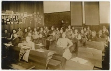 Classroom interior and young teacher RPPC circa 1908 - Milnor North Dakota ?