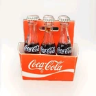 Miniature Six Pack of Glass Coca Cola Bottles in Paper Carrier Vintage