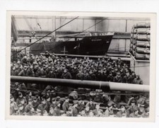 Vintage WWII photo of several troops men  coming on Navy boat , dock / m5