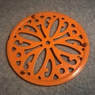 2 ROUND PAINTED CAST IRON TRIVETS ORANGE 7.75” — photo 4