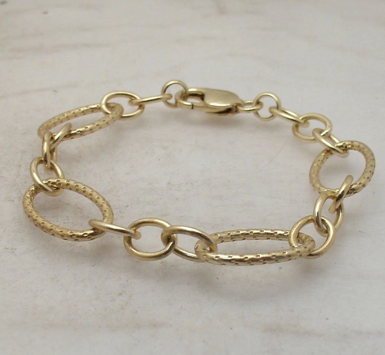 Bellezza Diamond Cut Oval Link Bracelet Lobster Clasp Solid Yellow Bronze - product detail image 2