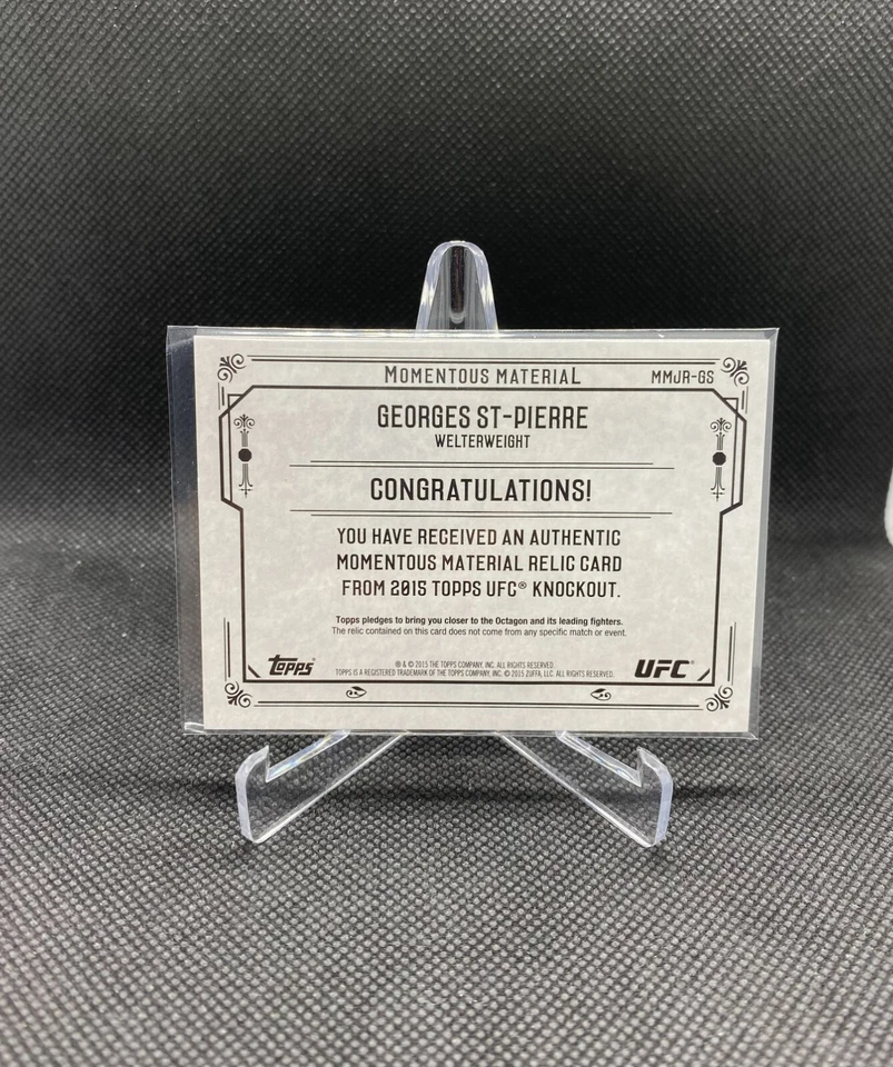 2015 Topps UFC Knockout Georges St-Pierre Momentous Material Relic Ruby Red #/8 - Image 2 of 2